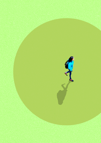 A person with long hair, wearing a blue jacket and backpack, walks alone within a large green circle on a light green background, casting a shadow behind them. The image is minimalistic and taken from above.