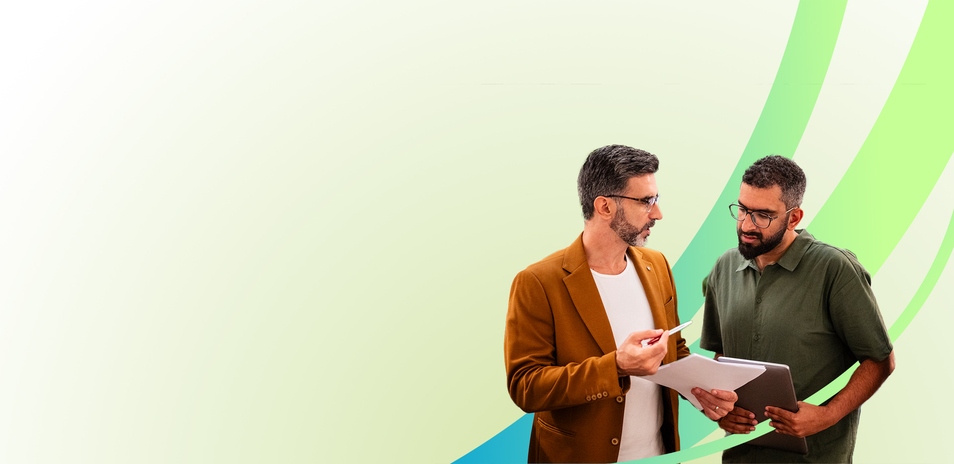 Two men standing and talking; one wears a brown blazer and holds papers, the other wears a dark green polo and holds a tablet. They are on a light background with green and blue curved lines.