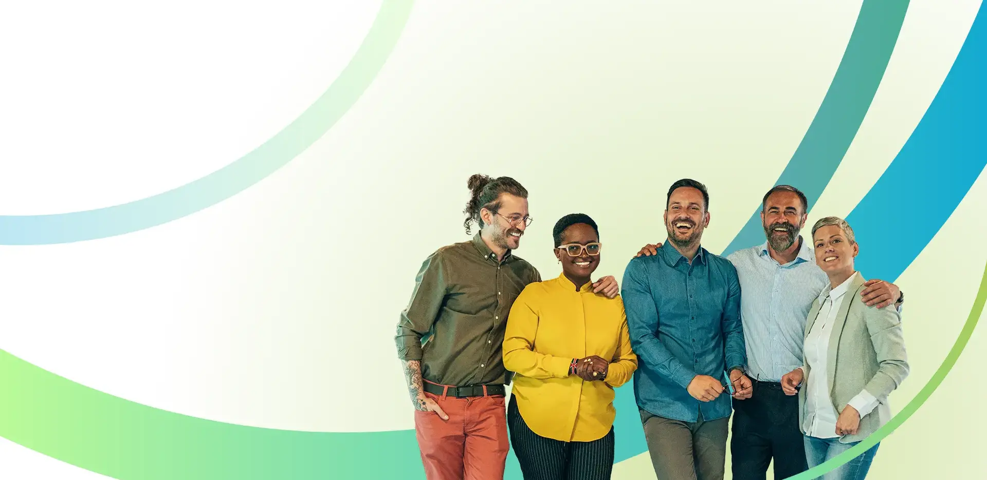 Five people stand together smiling in front of a light background with green and blue curved lines. They appear happy and friendly, with arms around each other or standing close.